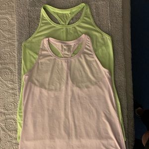 Athleta lightweight t-strap workout tanks.